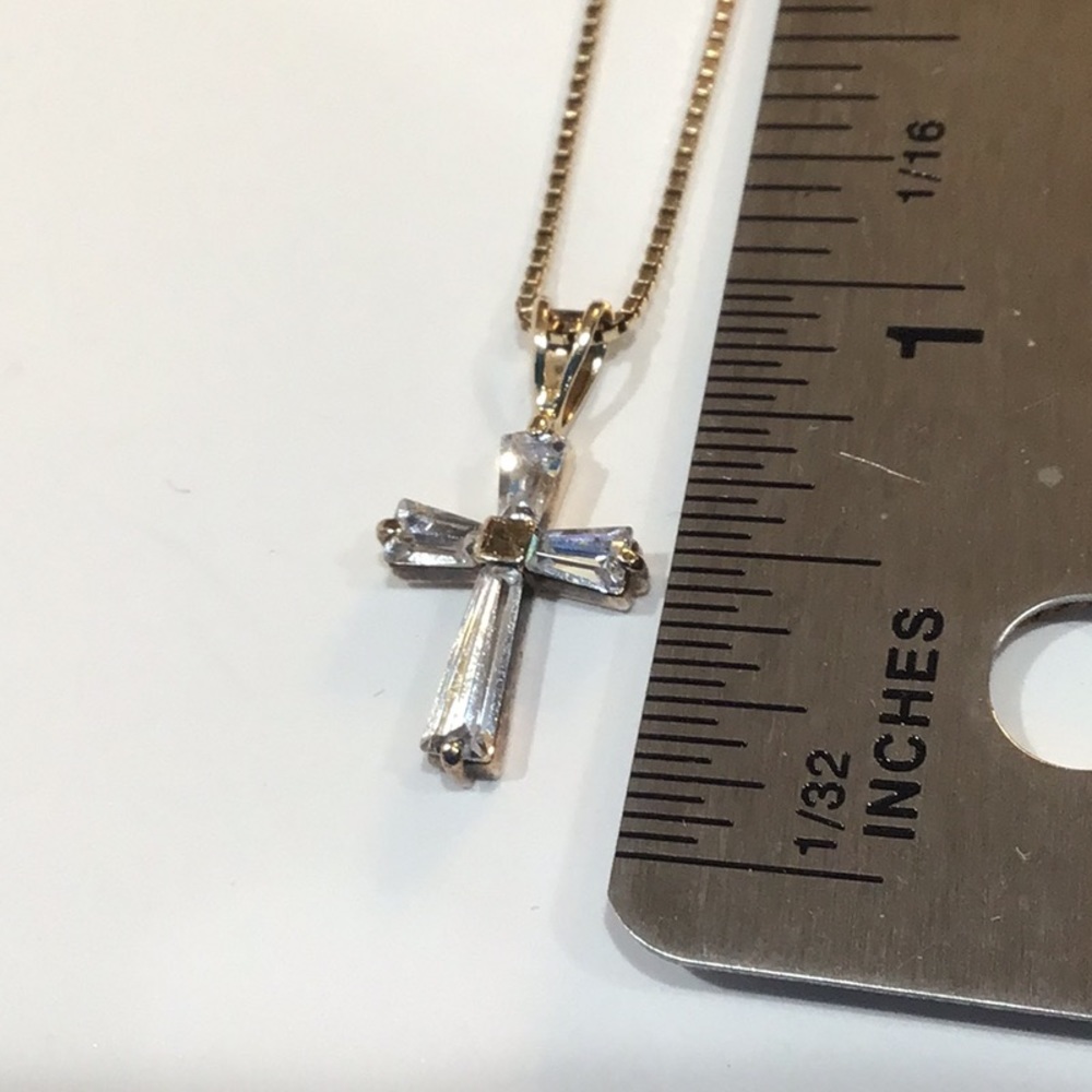 Sterling cross necklace with Cubic Zirconia insets.